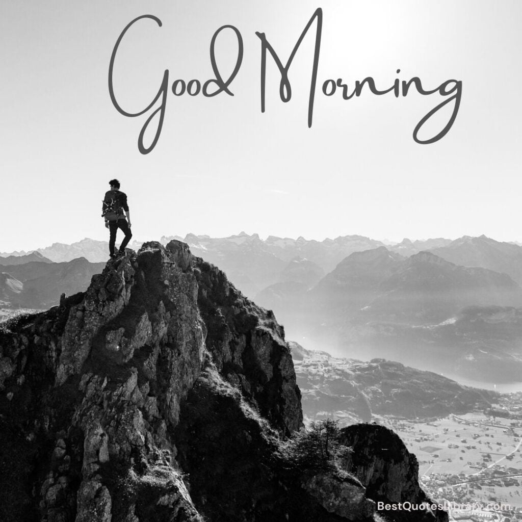 A Man standing on mountain in morning