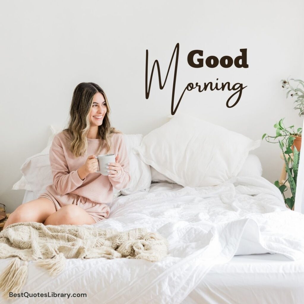 A beautiful girl sitting on bed looking outside with smile