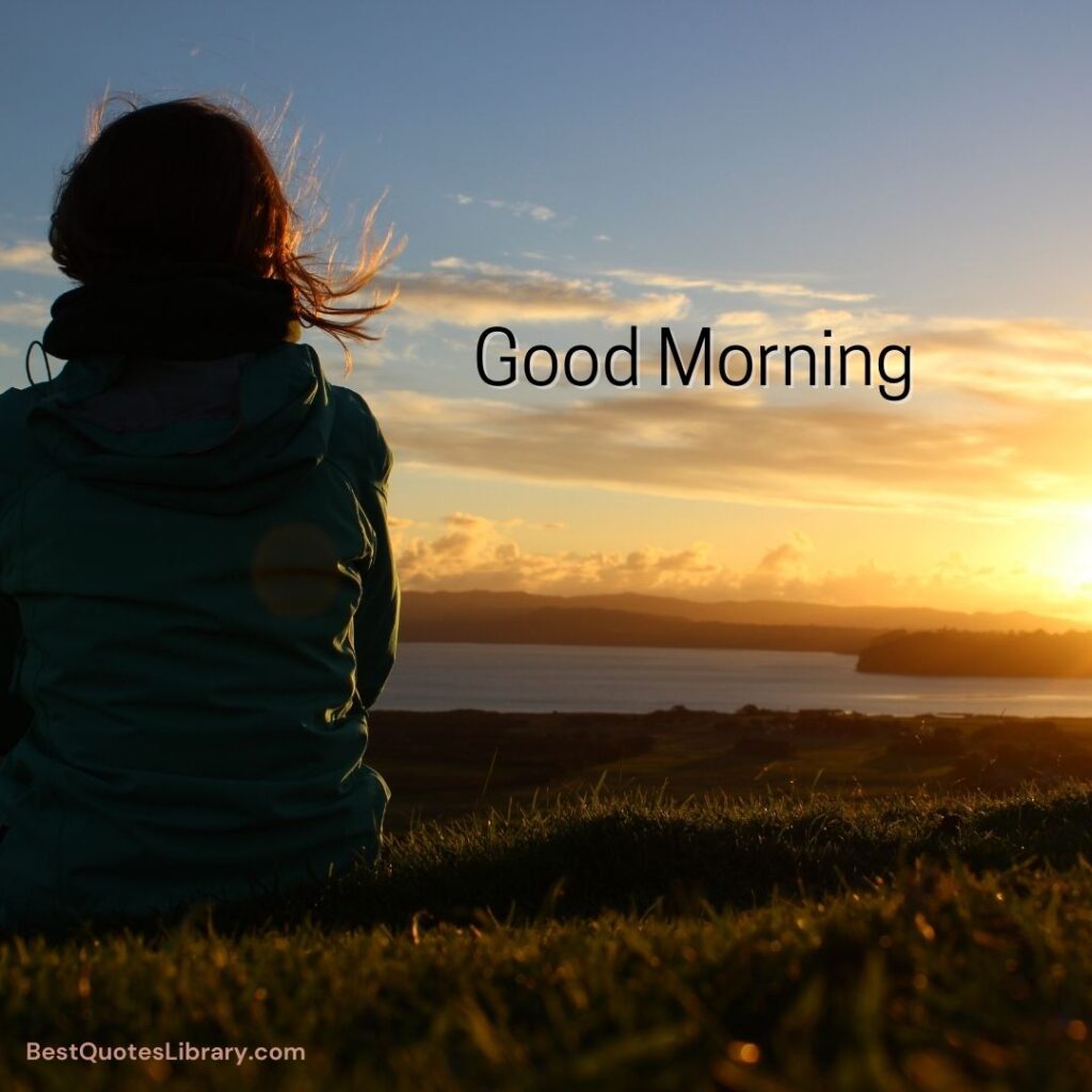 A lady sitting and relaxing in field grass in morning